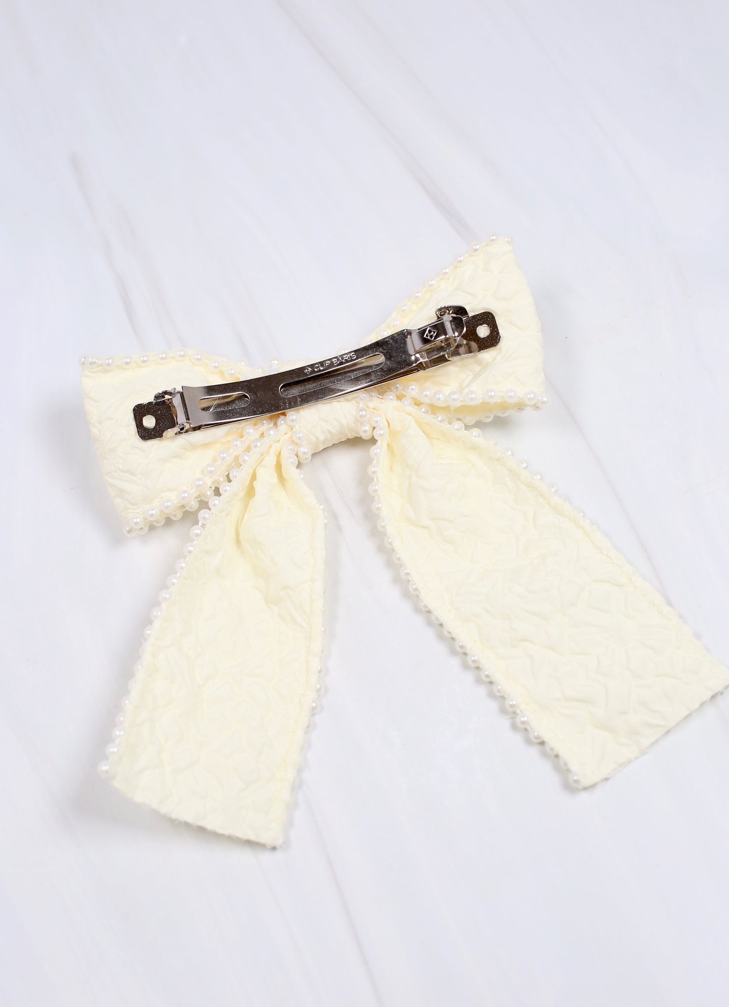 Blakely Pearl Lined Bow Cream